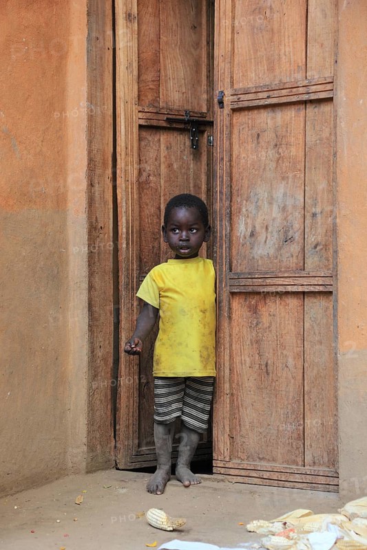 South Ethiopia, Ari people, little boy standing in the front door, Ethiopia, Africa