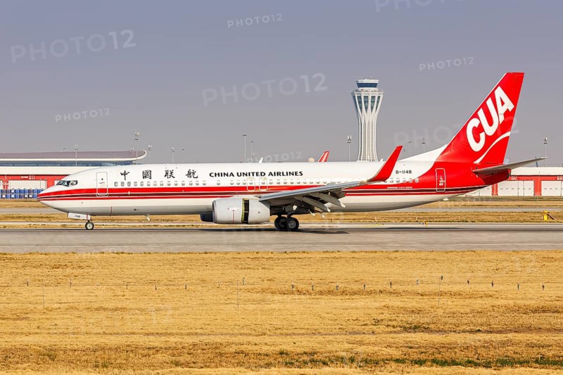 A Boeing 737-800 aircraft of China United Airlines CUA with the registration number B-1148 at Daxing Airport (PKX) in Beijing, China, Asia