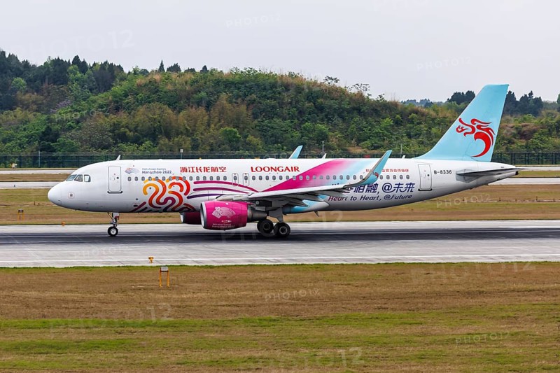A Loongair Airbus A320 aircraft with the registration B-8336 and the 19th Asian Games, Hangzhou 2022 special livery at Tianfu Airport (TFU) in Chengdu, China, Asia