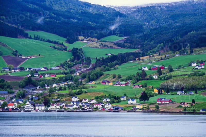 Mountains and Fiord over Norwegian Village in Olden, Innvikfjorden, Norway, Europe