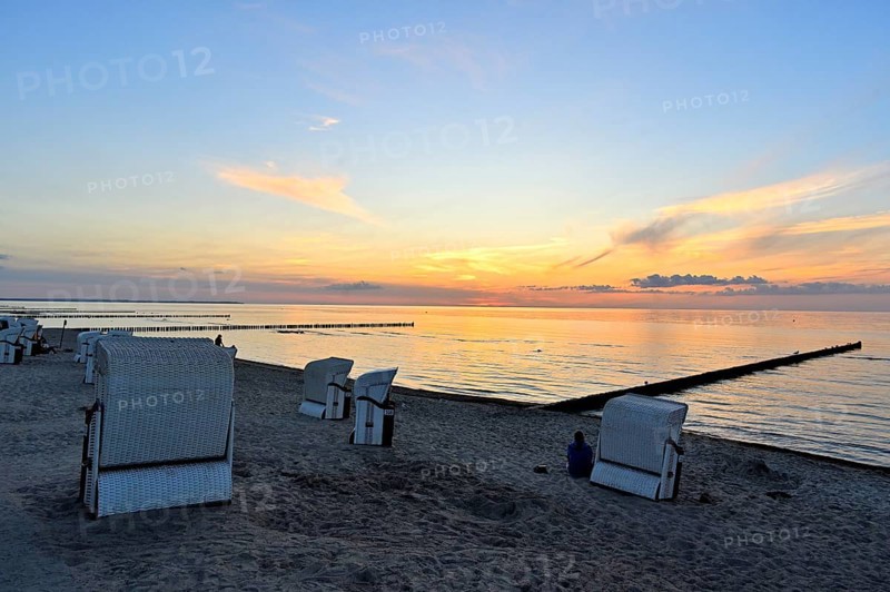 Beach chairs on the beach of the island of Poel at sunset, Mecklenburg-Vorpommern, Germany, Europe
