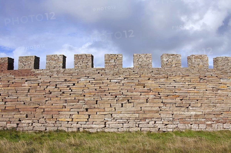 Defensive wall with crenellation of the Eketorp Castle, Iron Age fort in southeastern Öland, Sweden, Europe