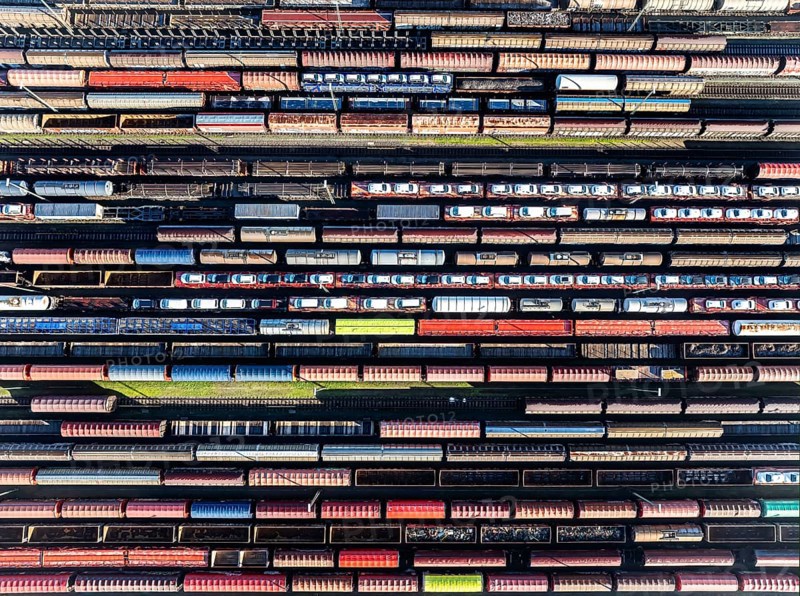 Deutsche Bahn AG marshalling yard. Many goods trains are parked on the tracks with tank wagons, car transporters and other wagons, companies transport a considerable part of their freight by rail, aerial view, Germany, Europe