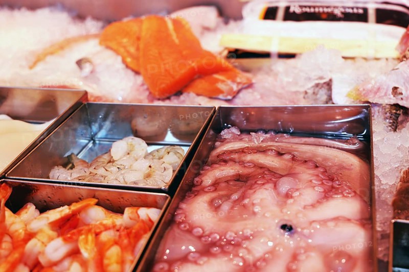 Close-up of a fish counter with fish and seafood