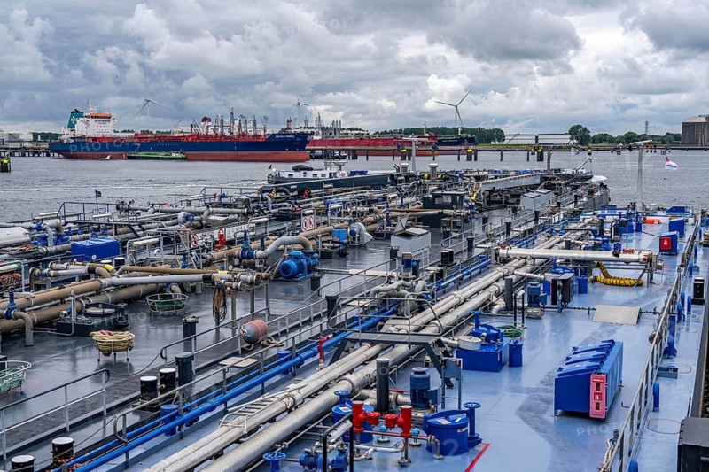 Inland tankers waiting for new cargo, in the petroleum harbour, seaport of Rotterdam, Maasvlakte, Rotterdam Netherlands