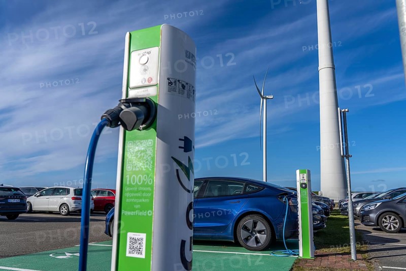 Electric car fast charging station, from the Dutch provider PowerGo, in the ferry harbour of Eemshaven, powered by renewable energy, Netherlands