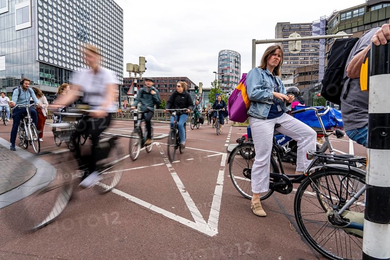 Central cycle path on the Vredenburgviaduct, at the Hoog Catharijne shopping centre, behind Utrecht Centraal station, in the city centre of Utrecht, heavy traffic, Netherlands