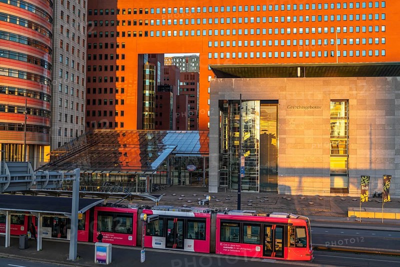Courthouse, right, building of the public prosecutor's office, red, on Wilhelminaplein, on the Nieuwe Maas, Kop van Zuid, Rotterdam, Netherlands