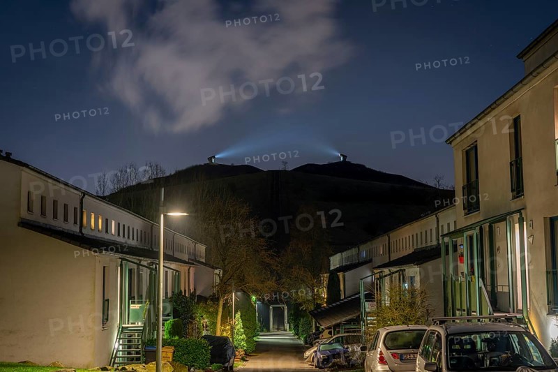 Rungenberg slag heap in the Buer district, Night Sign light installation, Schüngelberg housing estate, Zum Rungenberg street, Gelsenkirchen, North Rhine-Westphalia, Germany, Europe