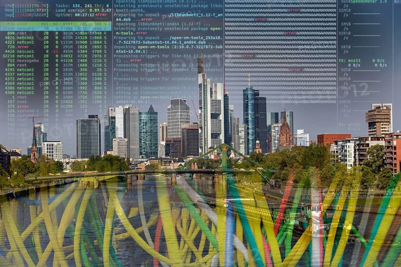 Symbolic image of critical infrastructure, skyline of Frankfurt am Main, data cable, hacker code