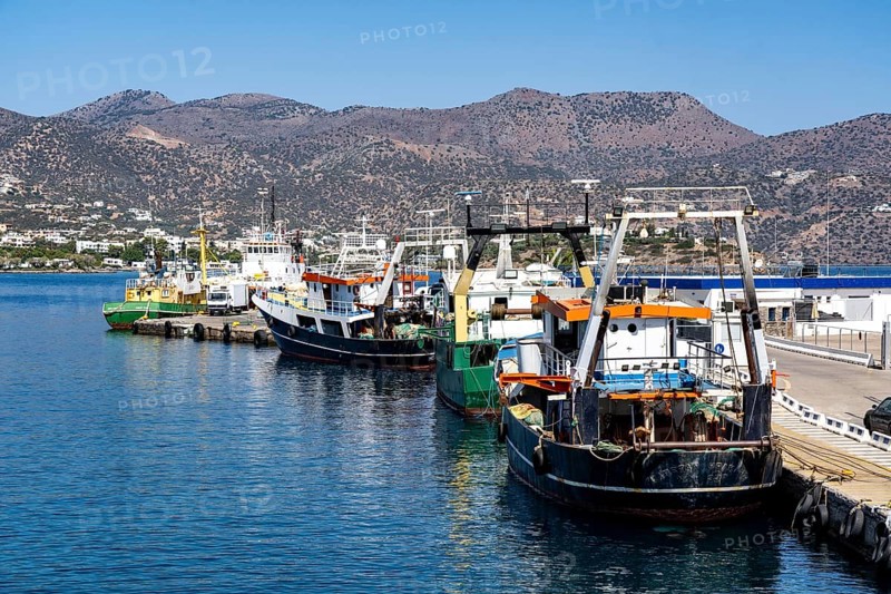 The village of Agios Nikolaos, in the eastern part of Crete, fishing boats in the harbour, Greece, Europe