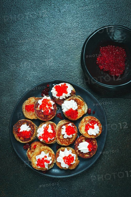 Demidoff pancakes, mini pancakes, with sour cream and red caviar, homemade, no people