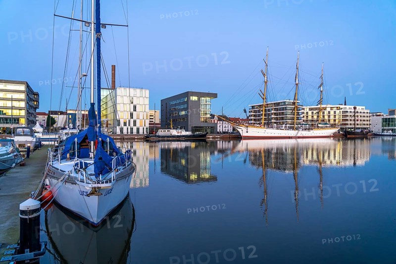 New harbour, harbour basin, harbour district, training ship Germany, residential buildings, office buildings, marina and museum ship, part of the Harbour Worlds, in Bremerhaven, Bremen, Germany, Europe