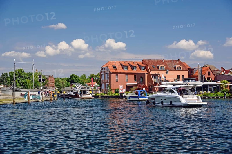 Europe, Germany, Mecklenburg-Western Pomerania, island town of Malchow, Lake Malchow, at the swing bridge, motor yacht, Malchow, Mecklenburg-Western Pomerania, Germany, Europe