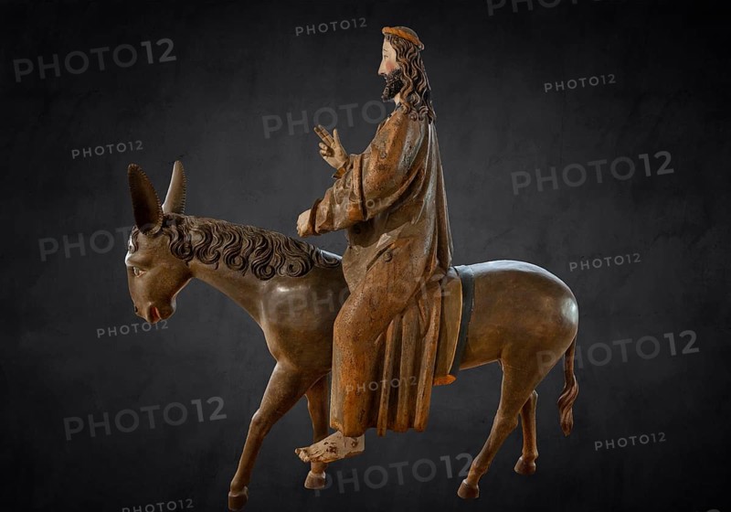 Palm donkey, detail of donkey's head, wooden figure from 1470, on dark background, Franciscan Museum, Villingen, Baden-Württemberg, Germany, Europe