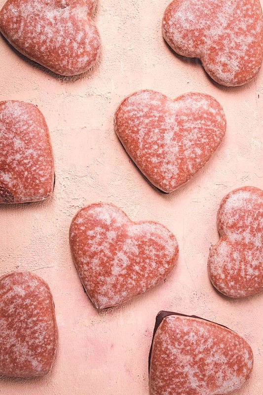Food wallpaper, chocolate glazed gingerbread, heart-shaped, top view, no people