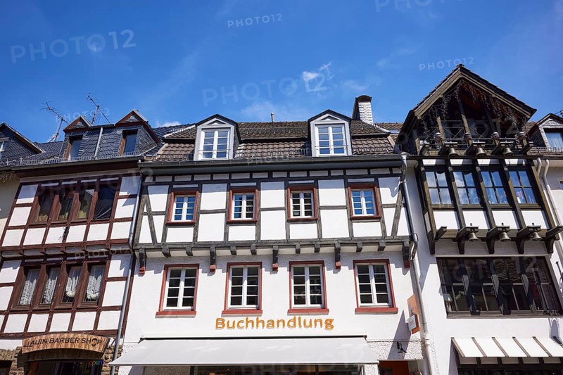 Library and barbershop on Marktstraße in Bad Münstereifel, Eifel, Euskirchen district, North Rhine-Westphalia, Germany, Europe