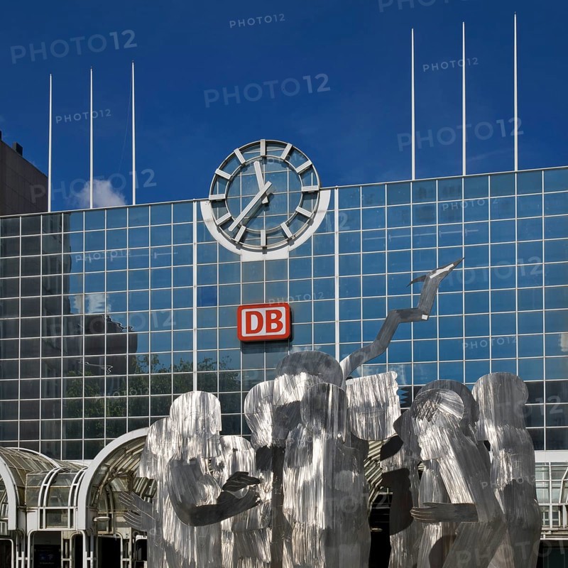 A stainless steel figure group at the main railway station entitled The Ring by Horst Antes, Düsseldorf, North Rhine-Westphalia, Germany, Europe
