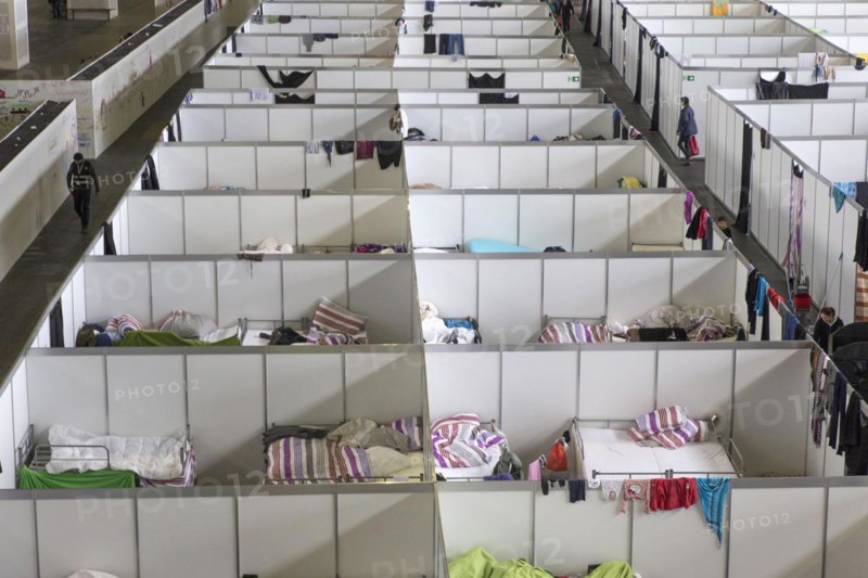 Temporary rooms with beds are set up in an emergency shelter for refugees on 9 December 2015 in a former hangar at Tempelhof Airport, Berlin, Berlin, Germany, Europe