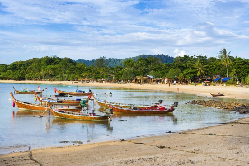 Longtail boats, fishing boats at Klong Khong beach, fishermen, sea, ocean, coast, seascape, coastal landscape, seashore, tropical, tropics, tropical beach, water, tropical island, island paradise, authentic, beach, empty, nobody, holiday, travel, tourism, island, beach holiday, sun, summer, asian, form of travel, beach holiday, Ko Lanta, Thailand, Asia