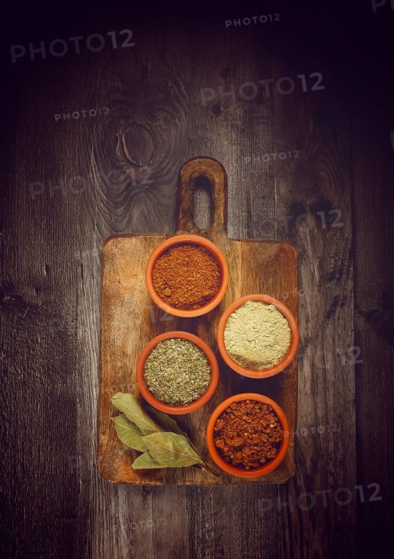 Georgian spices, in ceramic bowls, assortment, set of spices, utsho, adjika, Svan salt, ground coriander, top view, no people