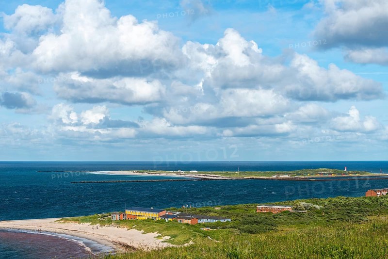 Dune of the high sea island Helgoland, view from the Helgoländer Oberland, south beach with youth hostel, dune south beach with lighthouse, cloudy sky, sunshine, North Sea, district Pinneberg, Schleswig-Holstein, Germany, Europe