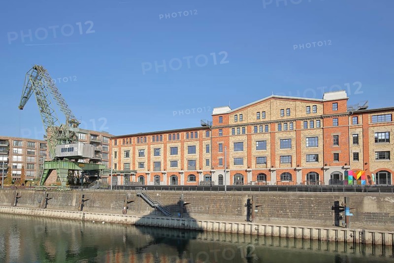 Old wine warehouse with harbour crane, quay, quay wall, gantry crane, container crane, shipyard crane, cargo crane, customs harbour, Neustadt, Mainz, Rhine-Hesse region, Rhineland-Palatinate, Germany, Europe