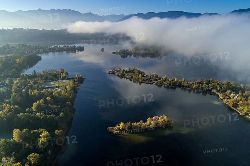 Aerial view of a lake in front of mountains in the morning light, fog, Staffelsee, view of the Bavarian Alps, Alpine foothills, Upper Bavaria, Bavaria, Germany, Europe