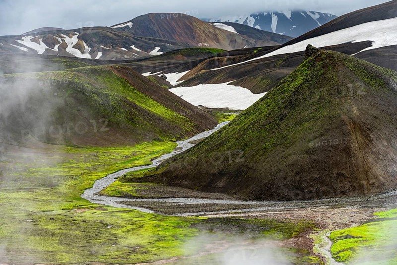Colourful volcanic landscape with hills and snow, volcanic steaming hot springs, Laugavegur trekking trail, Landmannalaugar, Fjallabak Nature Reserve, Icelandic Highlands, Suðurland, Iceland, Europe