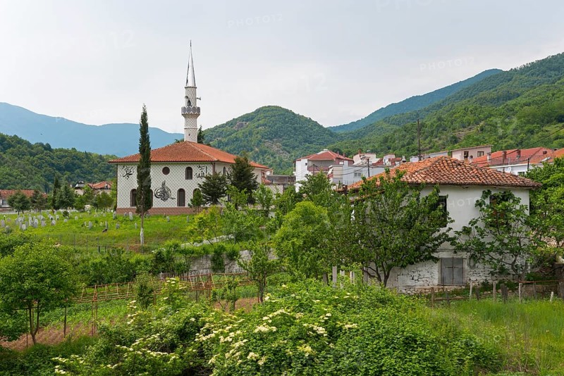 Rural scene with mosque and minaret in the foreground, surrounded by lush vegetation and mountains, Melivia, Melivoia, centre of the Pomaks, Myki, Xanthi, Eastern Macedonia and Thrace, Greece, Europe