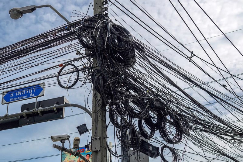 Power lines signpost Lat Krabang Road, Bangkok, Thailand, Asia