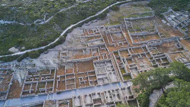 Drone shot, first morning light, Extensive ruins of an ancient site from a bird's eye view, with clearly visible walls and building structures, Kamiros, Archaeological site, Ancient city, Foundation of Doric Greeks, Rhodes, Dodecanese, Greek Islands, Greece, Europe