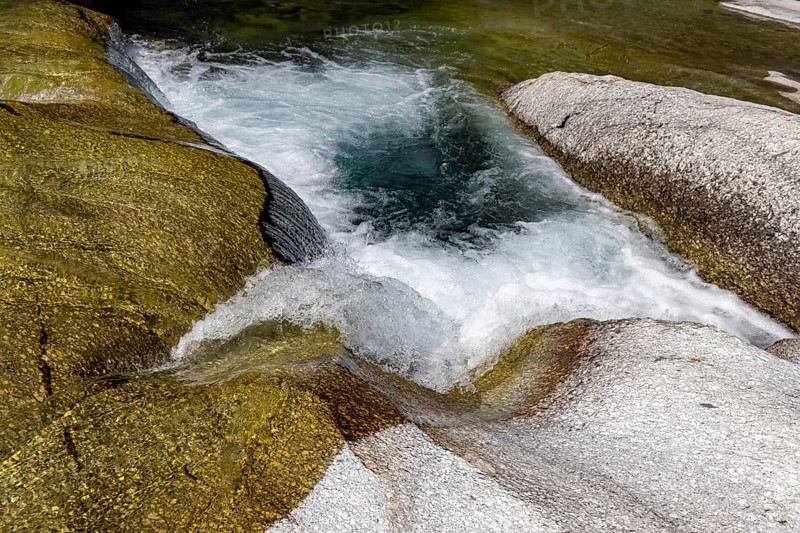 Rein da Christallina torrent near Medel. Pools with crystal-clear water in the riverbed. Canton of Graubünden, Switzerland, Europe