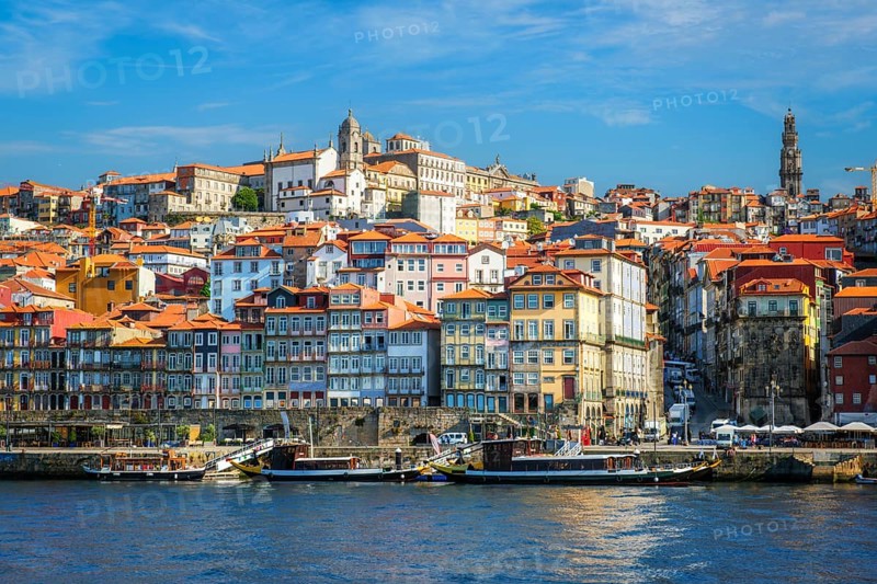 View of Porto city and Douro river from famous tourist viewpoint Miradouro da Serra do Pilar on sunset. Porto, Vila Nova de Gaia, Portugal, Europe