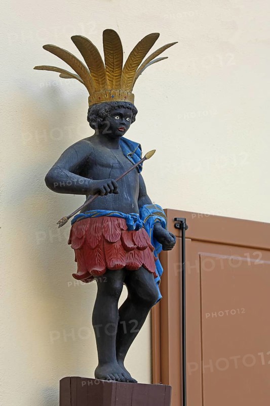 Sculpture Moor with arrow and headdress, Moor pharmacy, African, primitive people, detail, black, Meisenheim, Rhineland-Palatinate, Germany, Europe