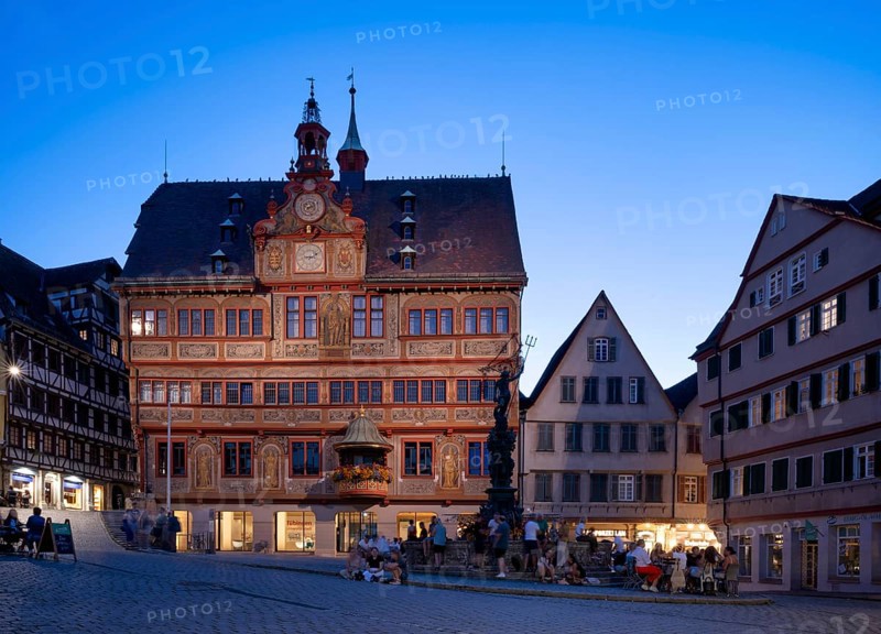 Historic town hall, illuminated, Neptune fountain, market square, in summer, people relaxing in cafés, evening, twilight, atmospheric, blue hour, Tübingen, Baden-Württemberg, Germany, Europe