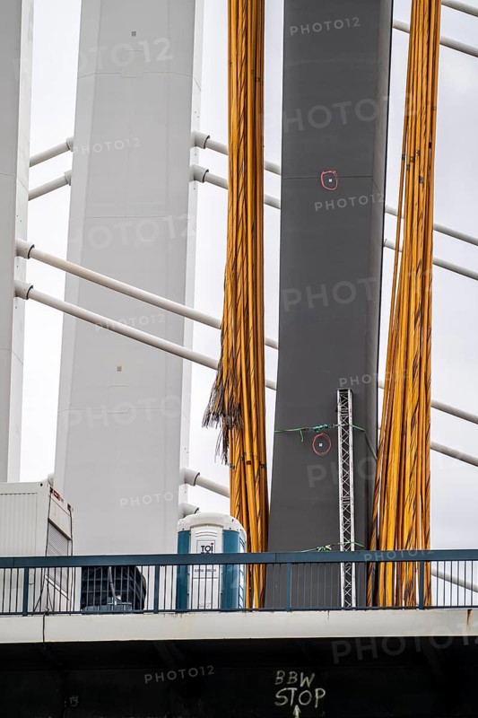 Demolition of the old A40 Rhine bridge Neuenkamp, next to it the first part of the new motorway bridge over the Rhine near Duisburg, severed suspension cables, after dismantling the second part of the new bridge will be built here, Duisburg, North Rhine-Westphalia, Germany, Europe
