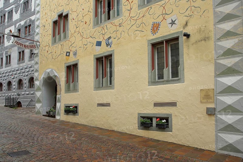 Historic building Pappenheimer with wall painting and decorations, nose shield with lance with helmet, inscription, arts and crafts, market square, Engen, Hegau, Baden-Württemberg, Germany, Europe