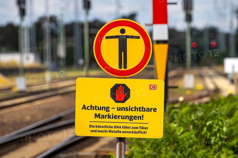 Deutsche Bahn AG warning sign for cable thieves: Attention, invisible markings against theft. Doberlug-Kirchhain railway station, Brandenburg, Germany, Europe