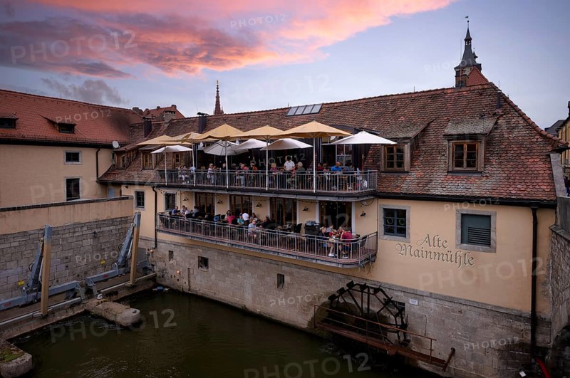 Restaurant, café, Old Main Mill, mill wheel, terrace with guests, Old Main Bridge, historic old town, Würzburg, twilight, Lower Franconia, Bavaria, Germany, Europe