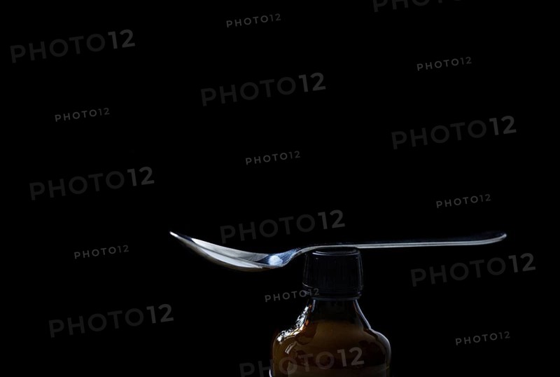 A spoon lying on a bottle in Berlin, 09/08/2024