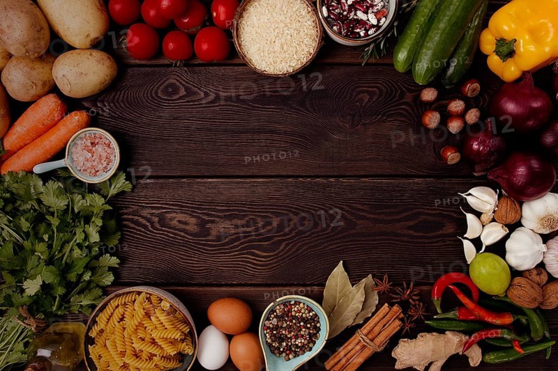Assortment of ingredients and spices, for cooking, on a wooden background, concept, top view, food background, horizontal, no people.toned