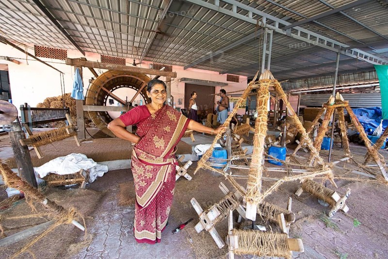 Indian worker, 59 years old, in the spinning mill of the Labourers Coir Mats and Mattings Cooperation, coir mat production, Muhamma, Alappuzha, Kerala, India, Asia