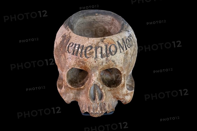 Holy water vessel in the shape of a skull, marble, 17th century, on a black background, Hällisch-Fränkisches Museum, Baden-Württemberg, Germany, Europe