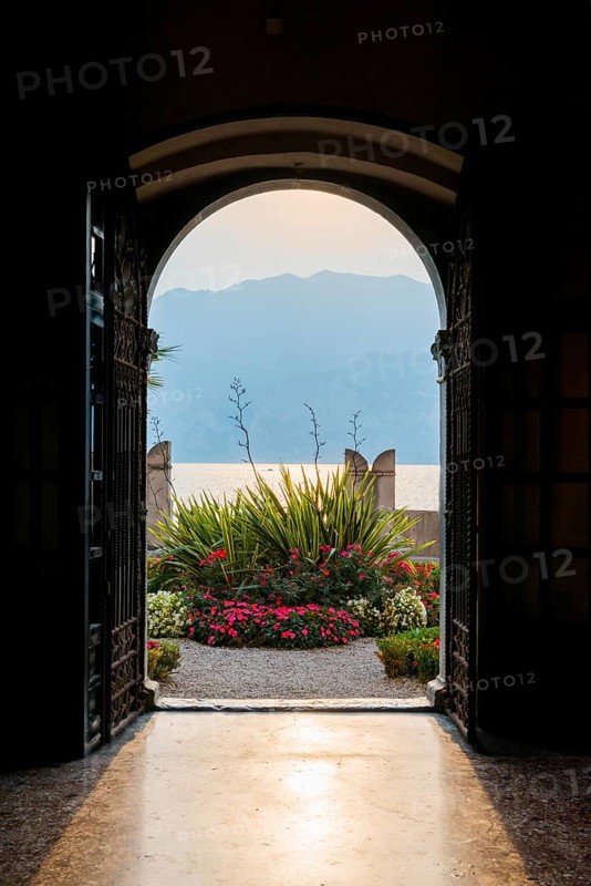View from the inside of a city villa, light, sun, sunbeam, backlight, dramatic, architecture, villa, historical, Malcesine, Lake Garda, Italy, Europe
