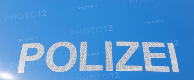 Police logo on a new police patrol car at the police station in Potsdam on 14/03/16. Brandenburg's police force received 28 Opel Zafira Tourer compact vans. The patrol cars are intended for the officers of the patrol service. In addition to the white and blue colour scheme, yellow stickers are applied to the bodywork to improve safety