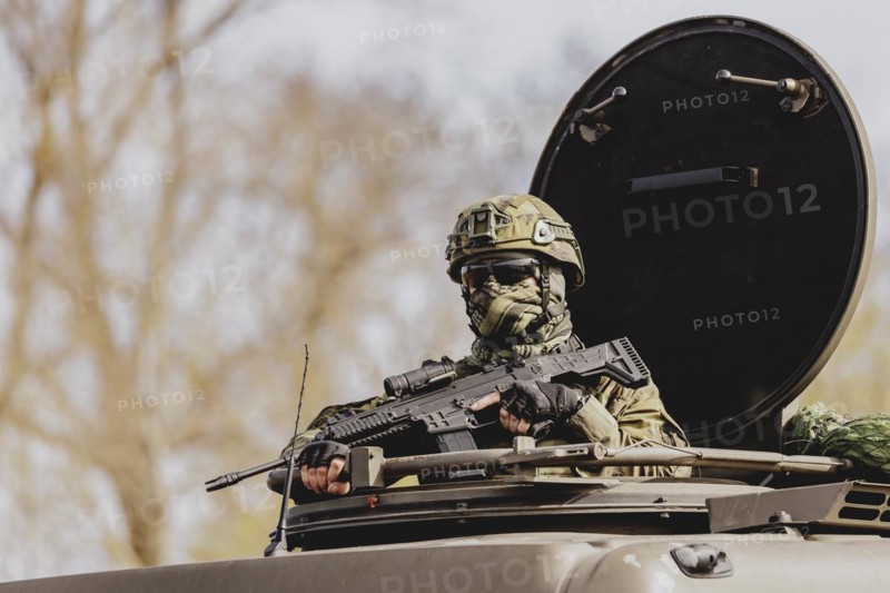 A Czech soldier drives through a forest as part of the military exercise 'Wettiner Schwert' with German and Czech soldiers near Tangermünde, 26 March 2024. 'Wettiner Schwert' is part of the NATO Quadriga exercise