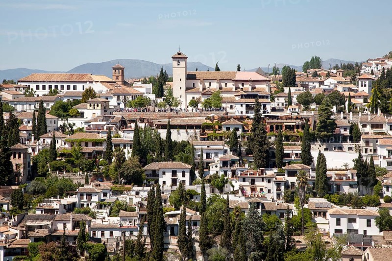 View of historic Moorish buildings in the Albaicin district of Granada, Spain seen from the Alhambra