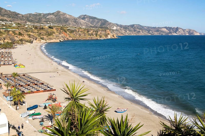 Playa Burriana sandy beach at popular holiday resort town of Nerja, Malaga province, Spain, Europe