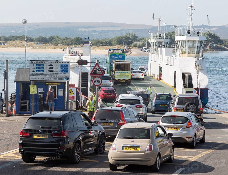 Vehicles boarding the Sandbanks to Shell Bay Studland ferry boat, Sandbanks, Dorset, England, UK